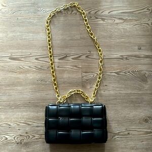Black with gold chain purse.